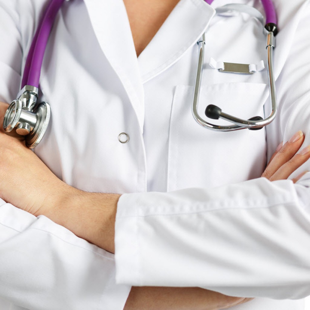 Uk doctor. Женщина ждет врача врача фото. Испания прием врача картинки. Атрибуты врача стоковые фото.