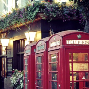 London Street with Red Telephone Booths in the UK