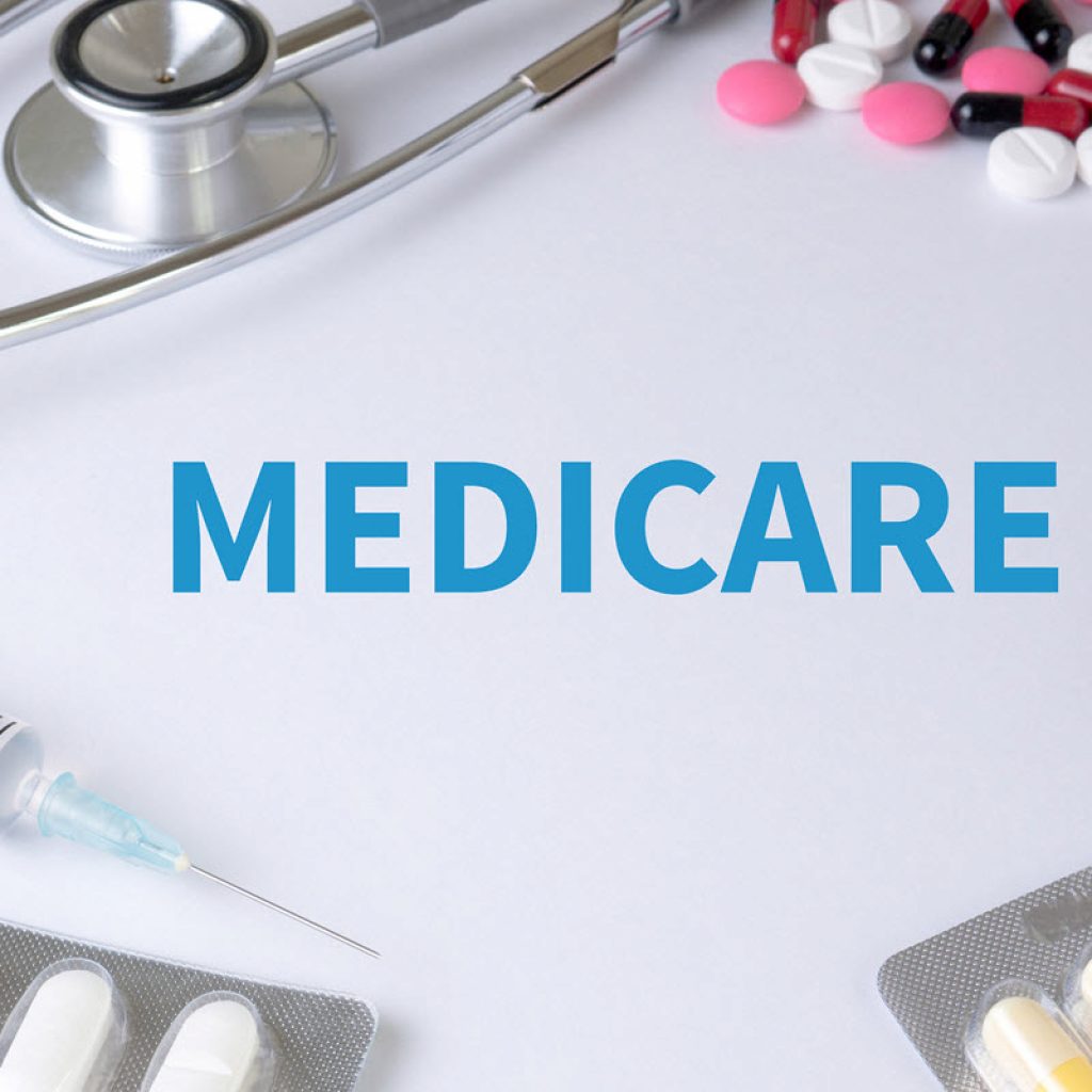 Medicare surrounded by a stethoscope and medical equipment