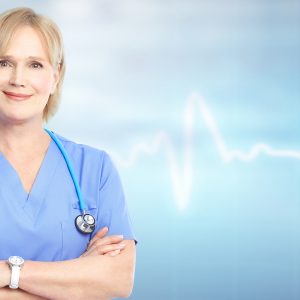 Family doctor over blue background. Health care.