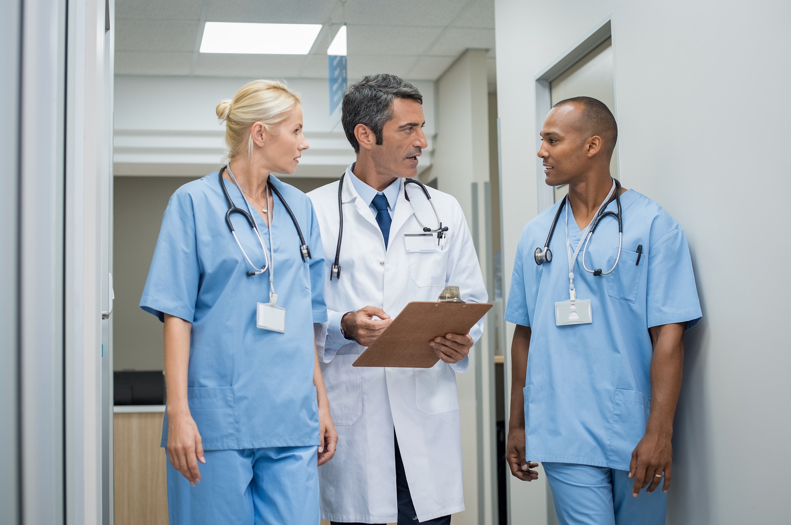 nurses in a hallway hospital