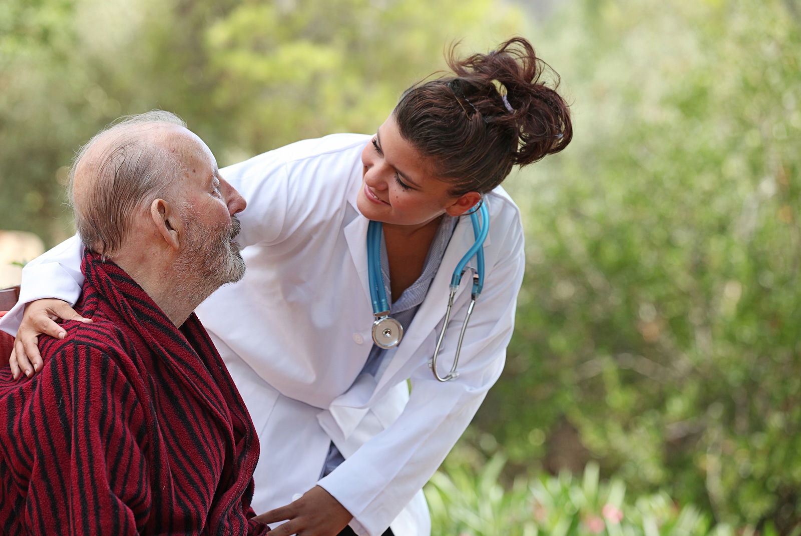 nurse showing care to patient