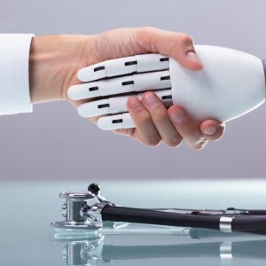Doctor And Robot Shaking Hands Over Stethoscope