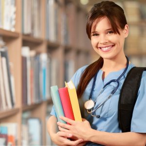 Nurse Student Education - Nursing Student Holding Books In Library